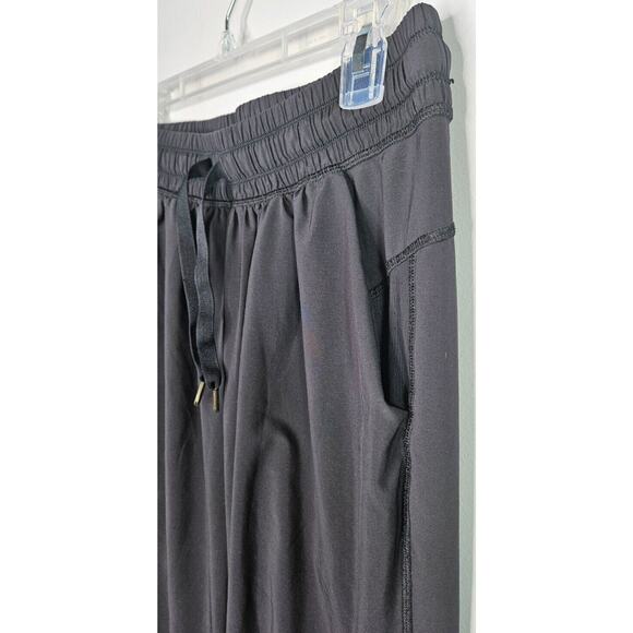 Lululemon Womens Jogger Pants 6 Black Nylon Stretch Dance Drawstring Tapered Leg - Picture 3 of 12